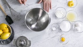 Lemon meringue ingredients laid out, ready for baking